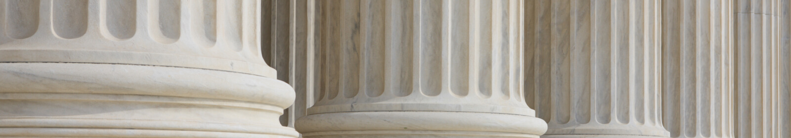 Detailed shot of white stone pillars